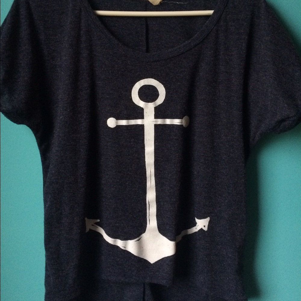blue shirt with anchor decal