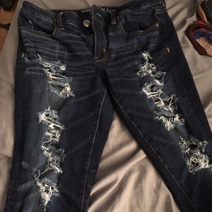 AE distressed dark wash skinny jeans