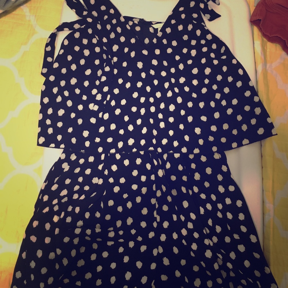 Never been worn romper with open back