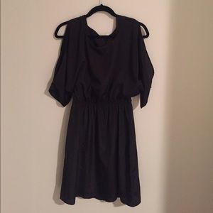 Black dress with sleeve slit