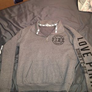 Grey quarter zip VS pink jacket