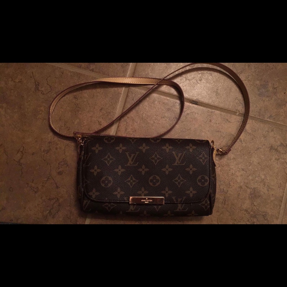 Louis Vuitton crossbody RESERVED!