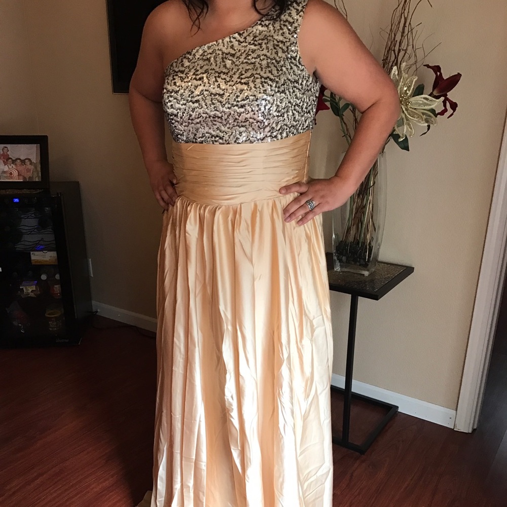 Gk sequined top off the should evening gown
