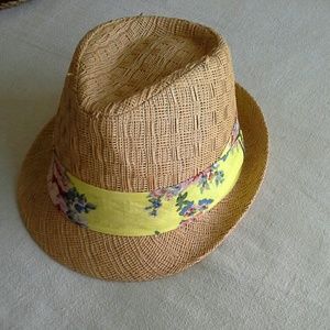 Straw fedora hat with yellow floral ribbon
