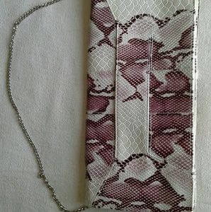 Daisy Fuentes snake skin pattern clutch