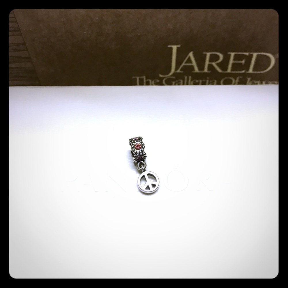 *SOLD* Pandora peace dangle charm.