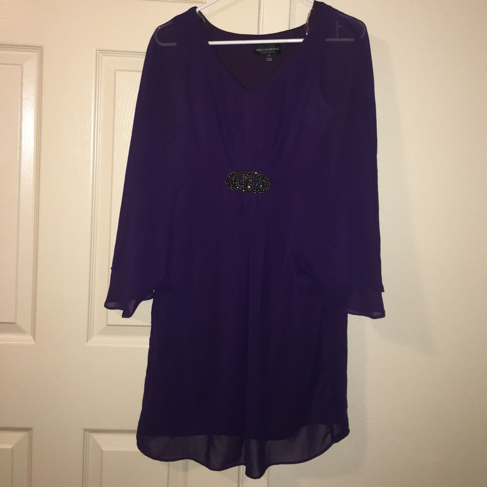 Dress with sheer layer