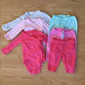 Carter's newborn set. 4 pieces