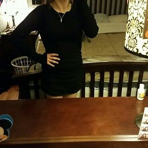 Plain black long sleeve dress.