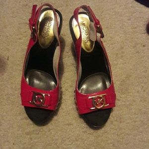 Mk red heels with gold studs