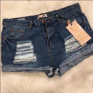 Distressed denim shorts