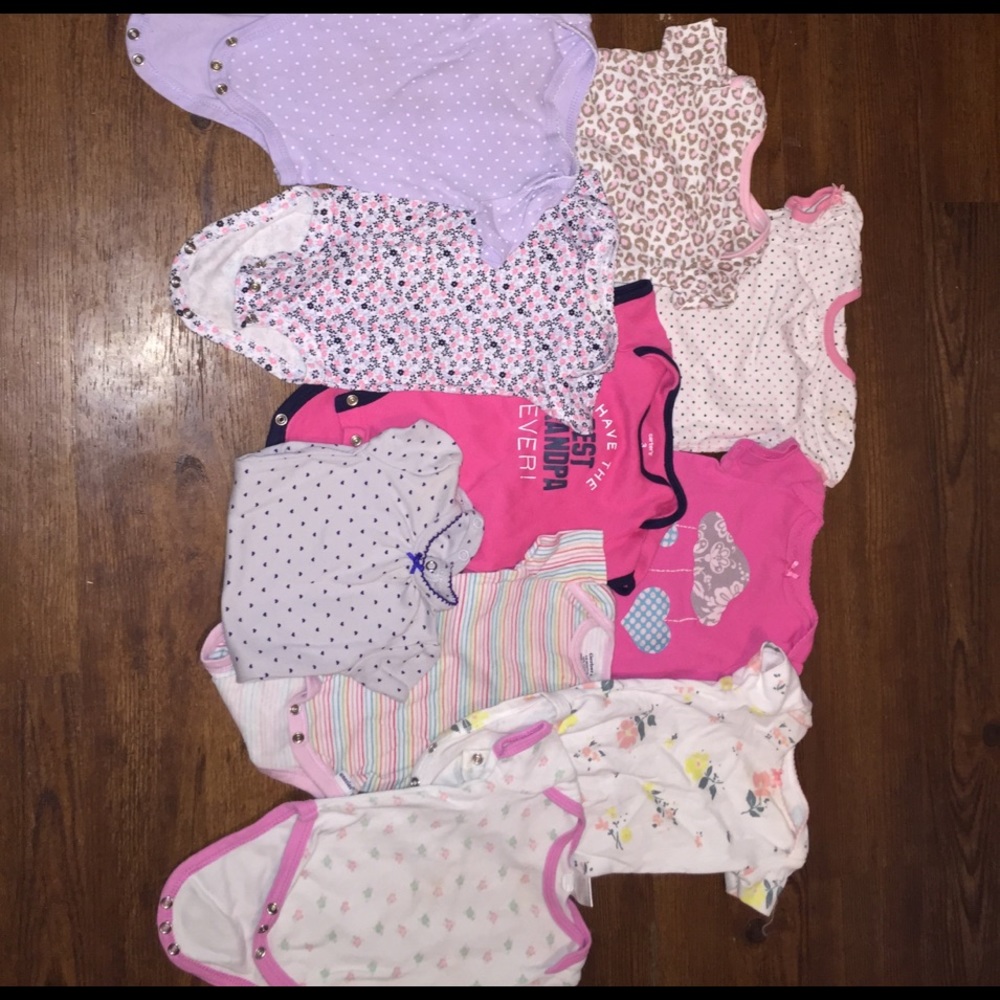 Lot of 3-6 month baby girl onesies.