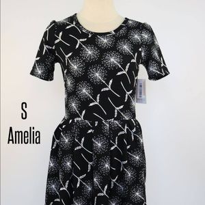LuLaRoe Small Amelia. Black with dandelions.