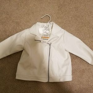 White faux leather motorcycle jacket.