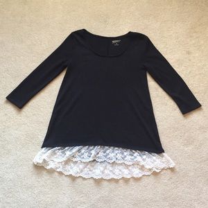 Black shirt with white lace at the bottom
