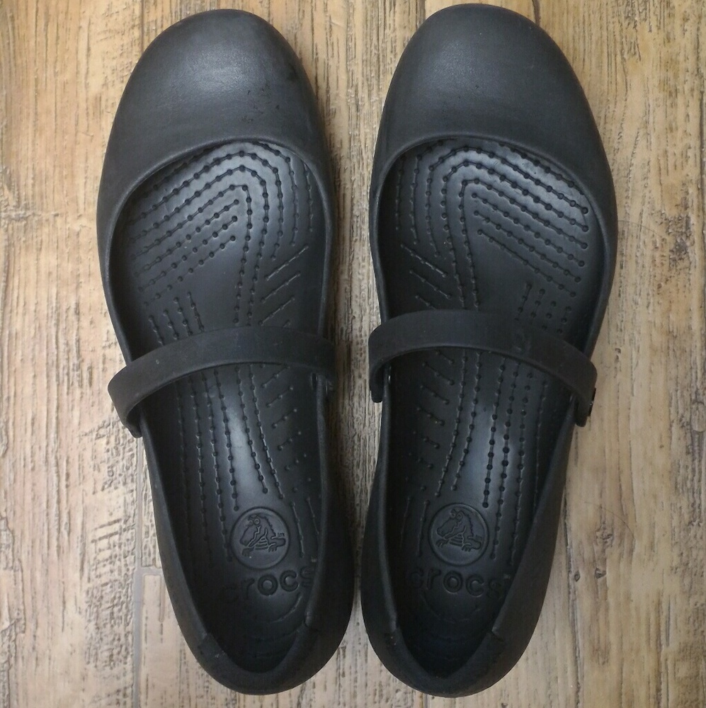 Black Mary-Jane Flats.