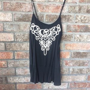 Black tank with rope detail.