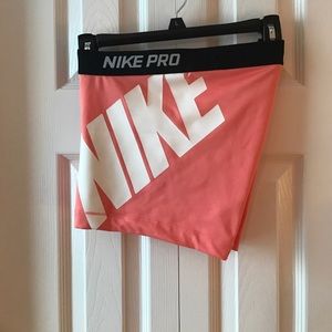 Pink and White Nike Pro 3" Compression Shorts