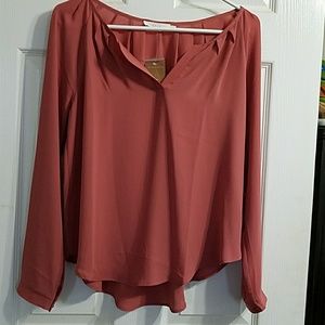 Beautiful blush colored blouse NWT.