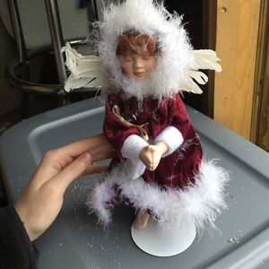 Musical porcelain doll