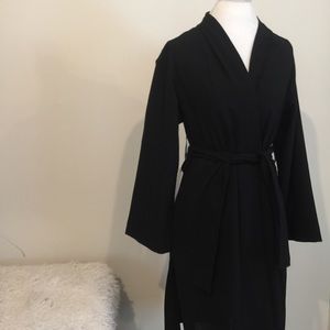 Black trench dress by Babaton for Aritzia.