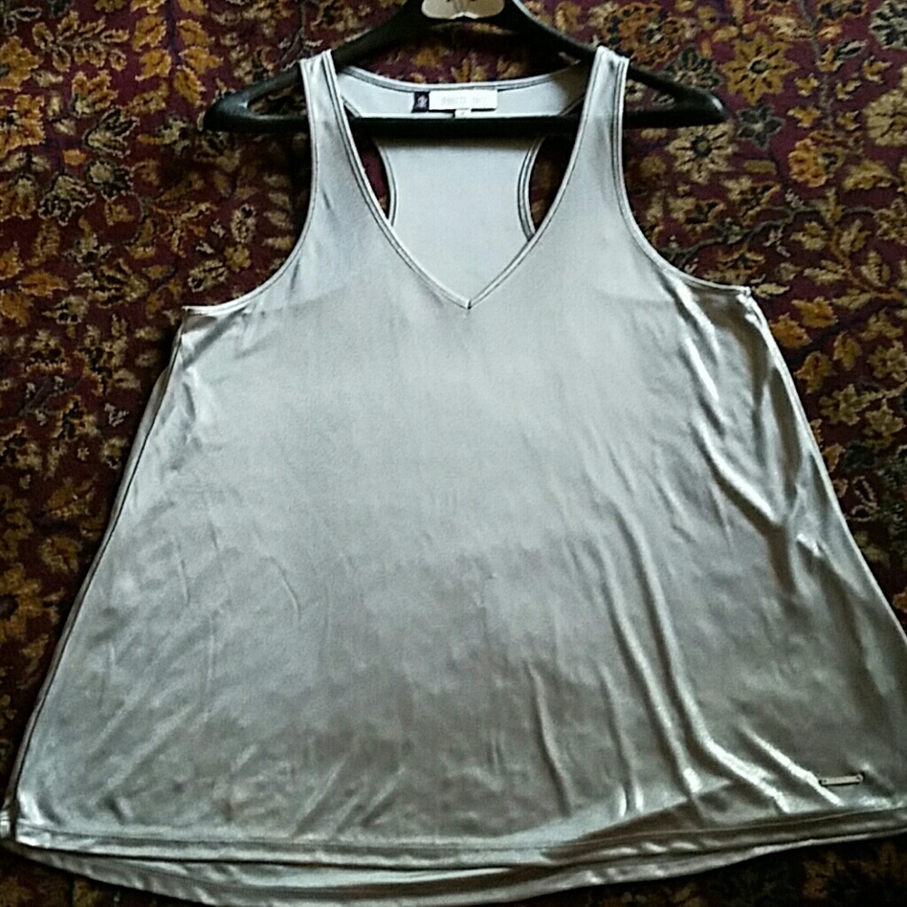 Blouse, sparkly and flows.  Never worn.