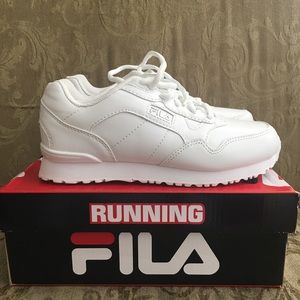 Brand new fila white shoes.