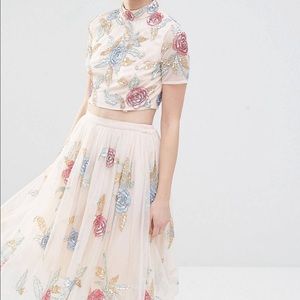 Worn only 4 times . In perfect new condition