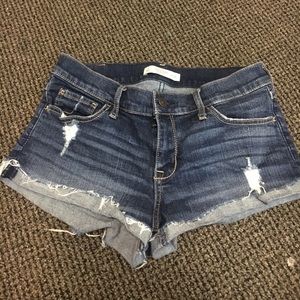 Distressed denim shorts