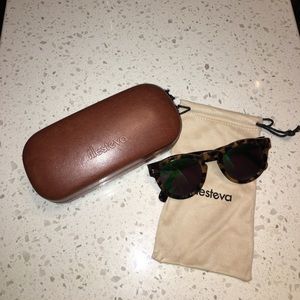 Illesteva sunglasses with green lense