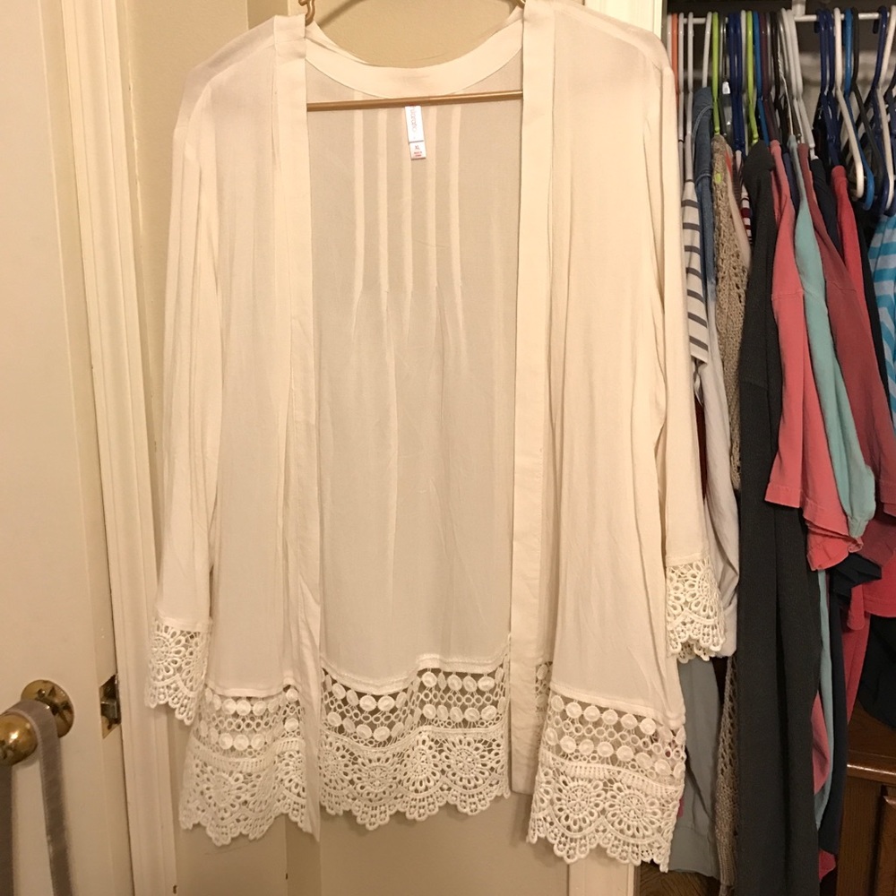 Cardigan. Cream color.