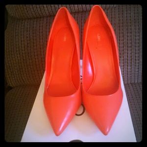Neon orange pointy toe shoe
