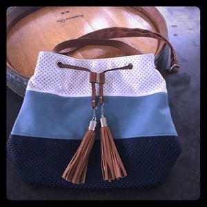 Pretty Spring/Summer bag with laser cut detail.