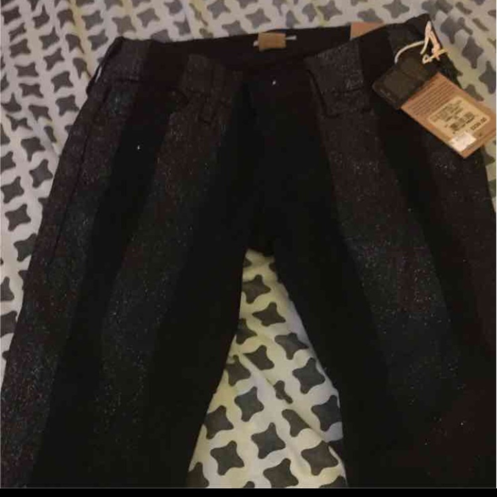Black striped glitter True Religion Jeans.