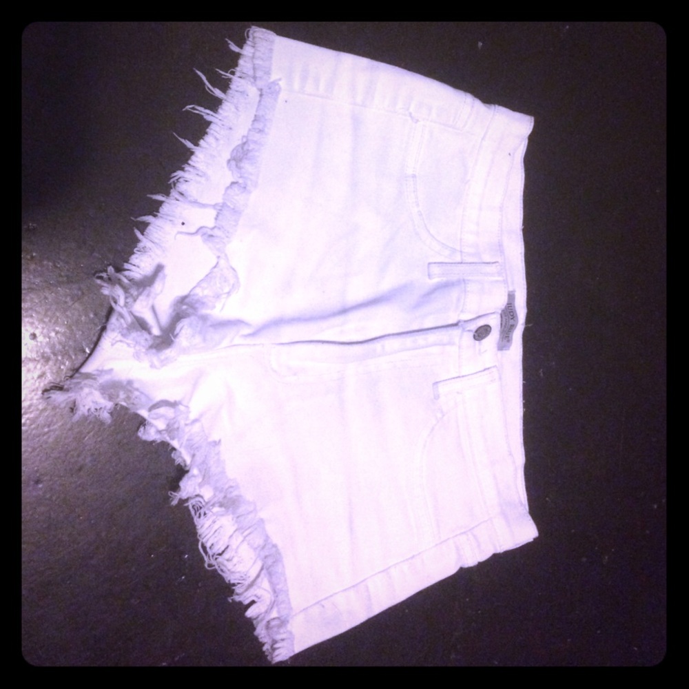 White distressed shorts