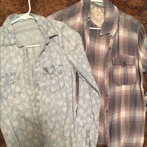 One plaid and one floral button down shirt.