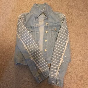 Distressed denim jacket