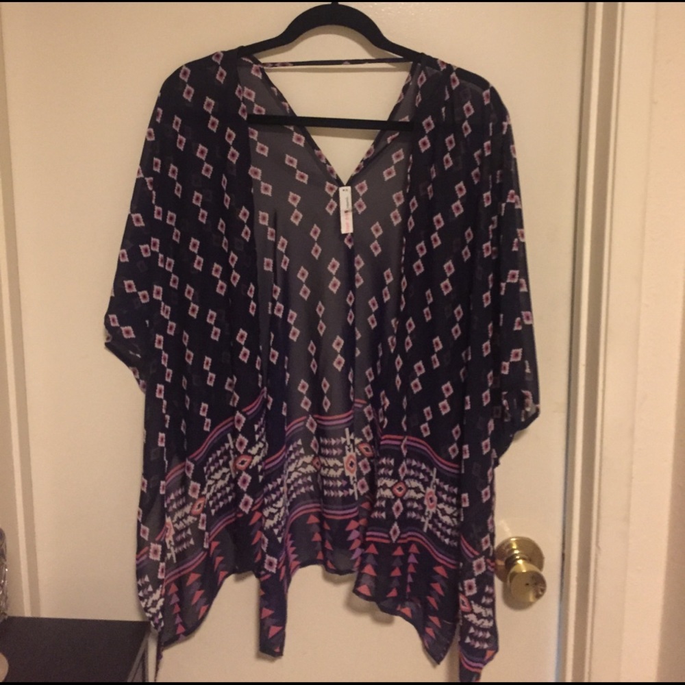 thin, over throw cardigan