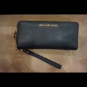 Jet Set Travel Leather Continental Wristlet