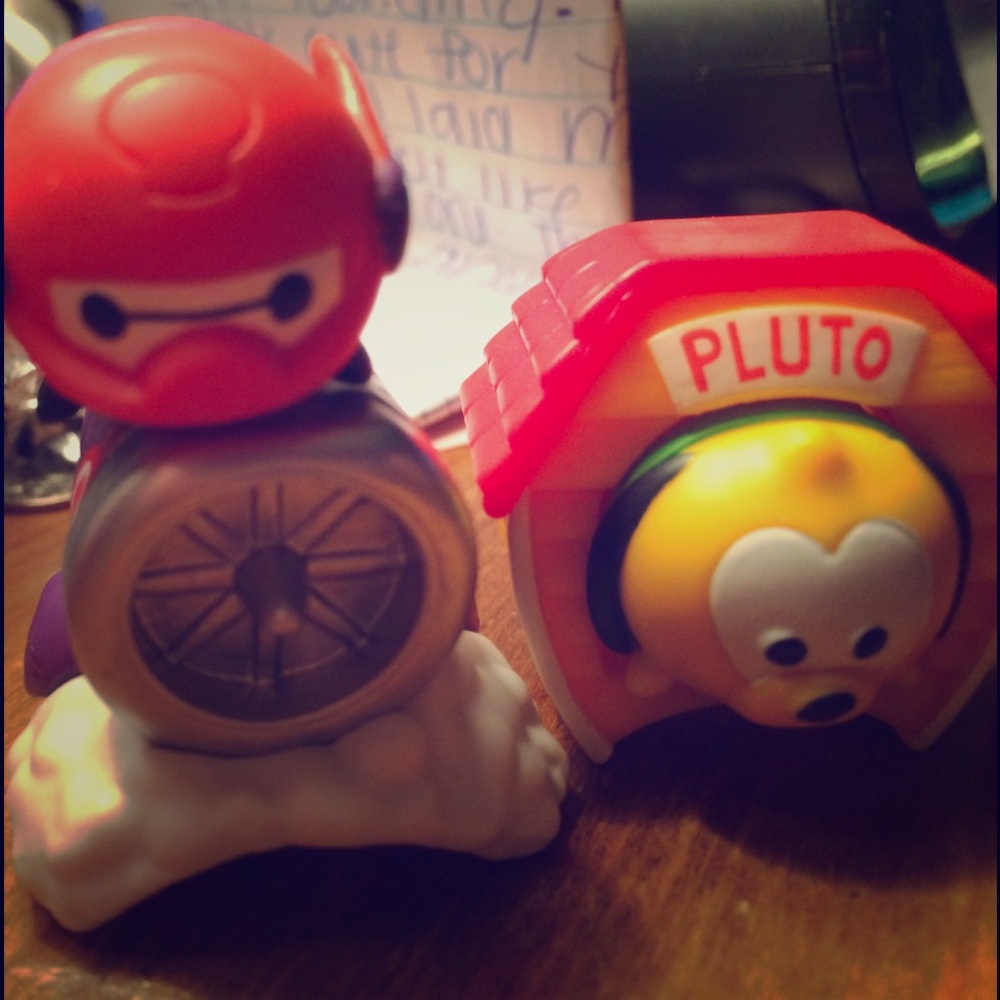 Pluto and he guy from big hero 6 lol