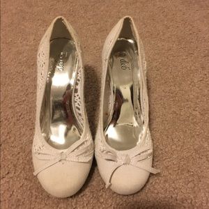 White juniors high heels.