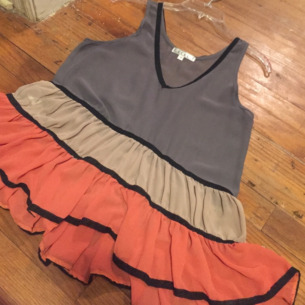 Grey, tan and orange peplum tank