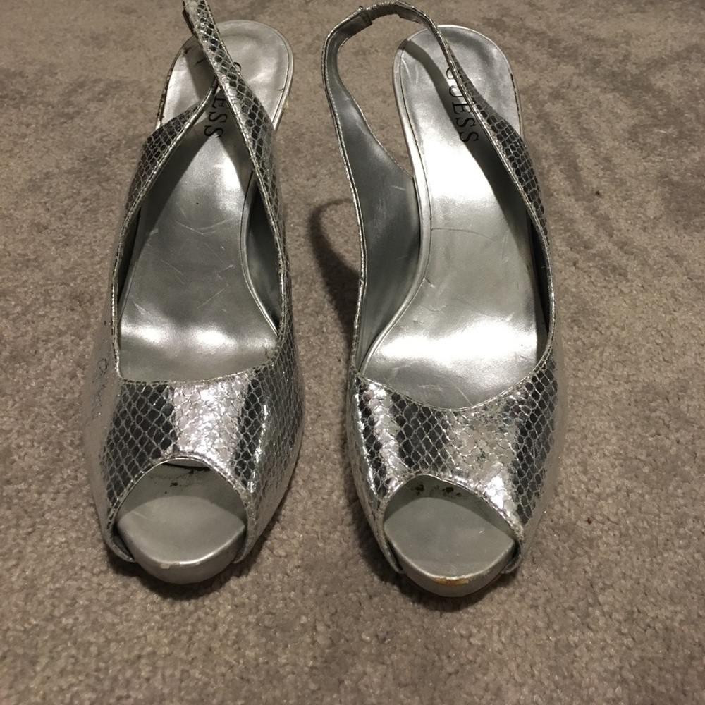Guess silver sling-back heels.