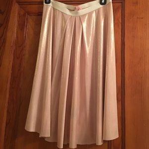 Pink metallic skirt.