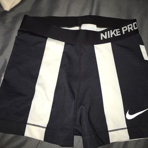 Black and white stripped Nike pros