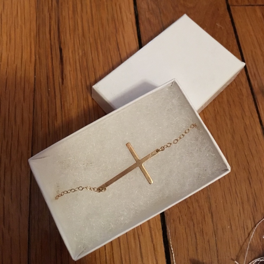 Gold sideways cross necklace