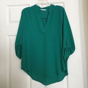 Like new!!!  Boutique brand teal tunic