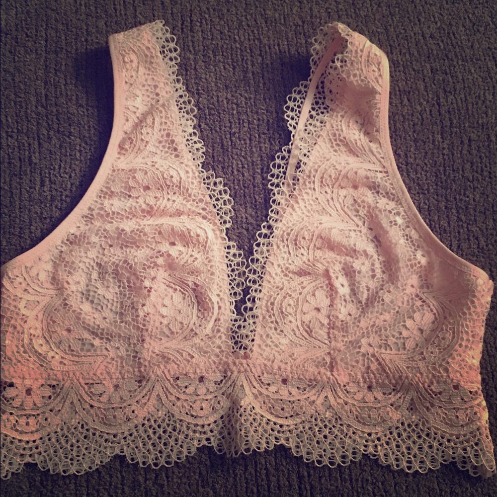 Lace bralett with satin inside cups.