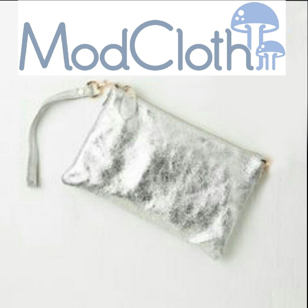 Modcloth Distressed silver wristlet/clutch