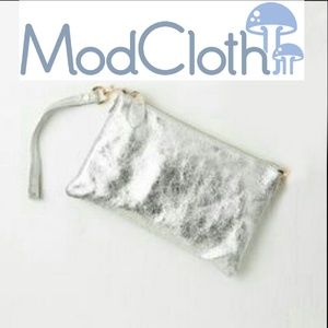Modcloth Distressed silver wristlet/clutch